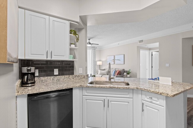 Kitchen with Stainless Steel Appliances at Verona at Boynton Beach Apartments in Boynton Beach, FL 33426 - Verona at Boynton Beach