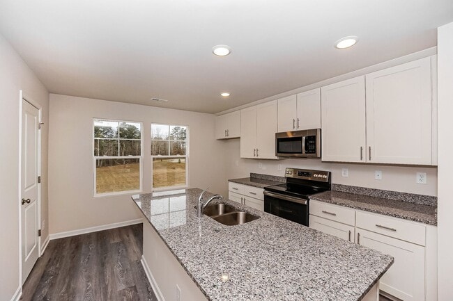 Building Photo - Brand New End Unit Townhome | 3 BR/3.5BA | 1-Car Garage | Near Downtown Mooresville