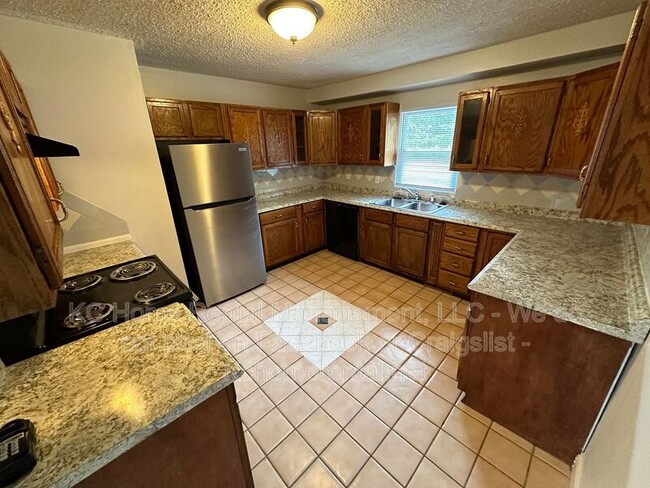 Foto del edificio - 10700 E 28th Terrace S