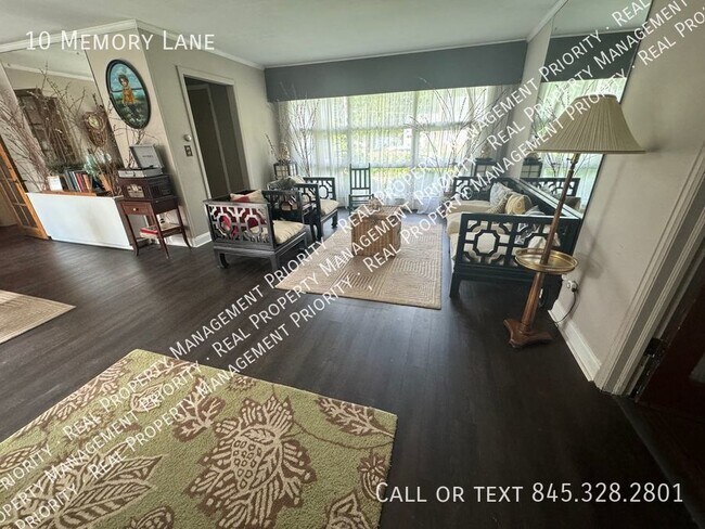 Foto del edificio - Fully Furnished 3 BR Home in Tranquil Comm...