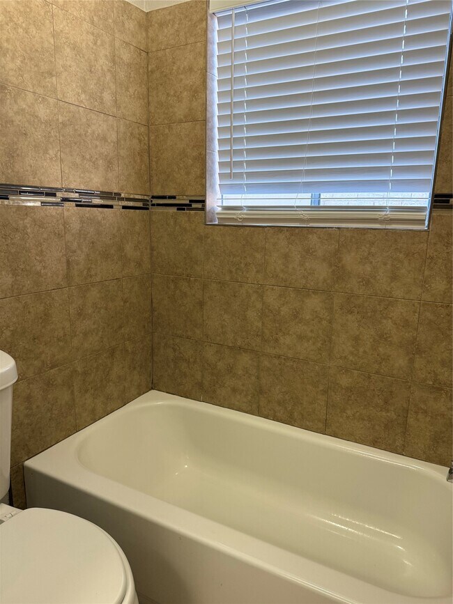 Foto del edificio - 6573 S Briar Bayou Dr