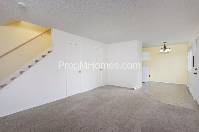 Building Photo - Discover Modern Comforts & Garden Serenity in Foster-Powell!