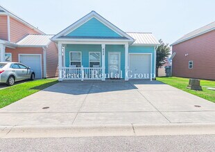 Building Photo - 605 Surfsong Way