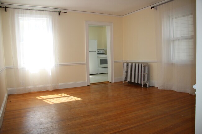Newly painted. New fixtures in kitchen includes dishwasher. Hardwood floors throughout - 7 Allen Ct