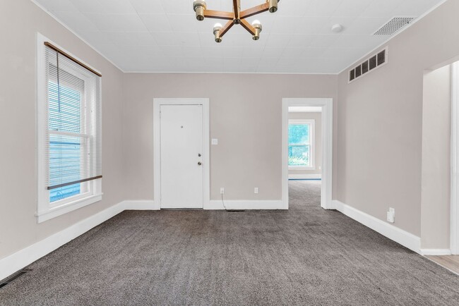 Building Photo - Charming Home with Updates and Covered Por...