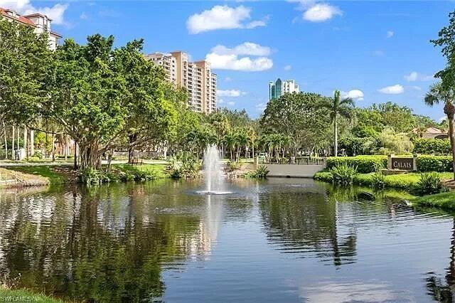 Building Photo - 7032 Pelican Bay Boulevard, Unit 103