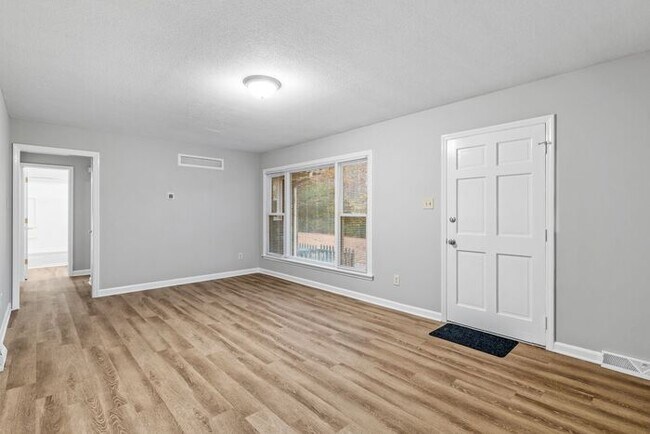 Building Photo - McLeansville - Minutes from Elon & Greensboro! Few Acres, Brick Duplex, Just Painted, New Carpet,...