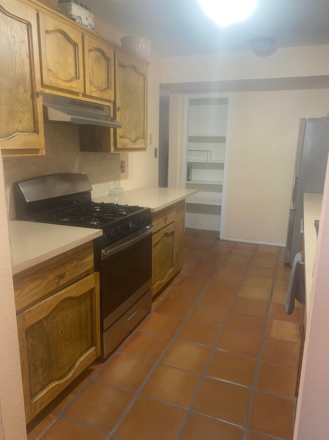 Kitchen: Gas range, new fridge, microwave, dishwasher, pantry - 1083 Sunshine Way