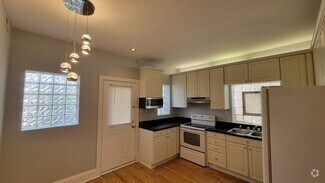 Building Photo - 5807 N Artesian Ave