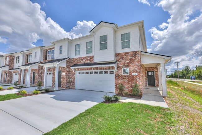 Building Photo - BRAND NEW Luxury 3/2.5 Townhome - MOVE IN ...