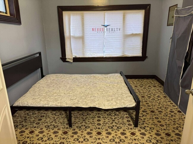 Building Photo - 26-28-28 96th St