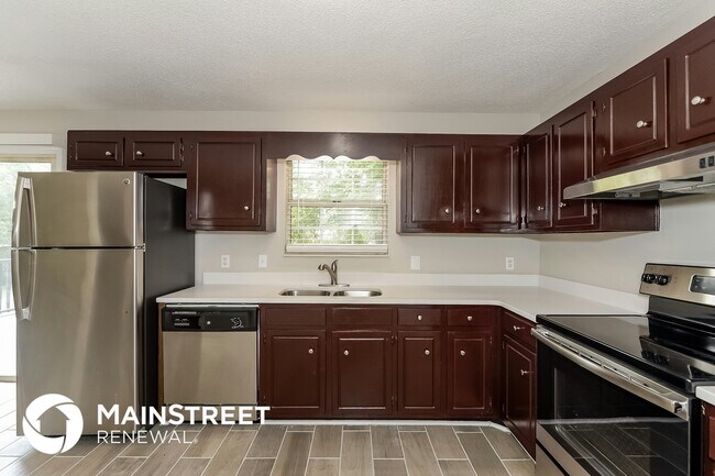 Foto del edificio - 3216 Country Lawn Dr