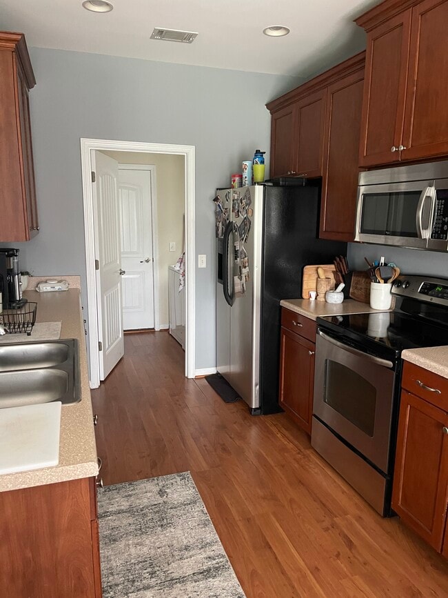 Galley Kitchen/laundry room out to garage - 194 Chapel Lk S