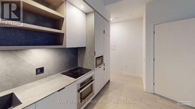 Building Photo - 55 Charles St E