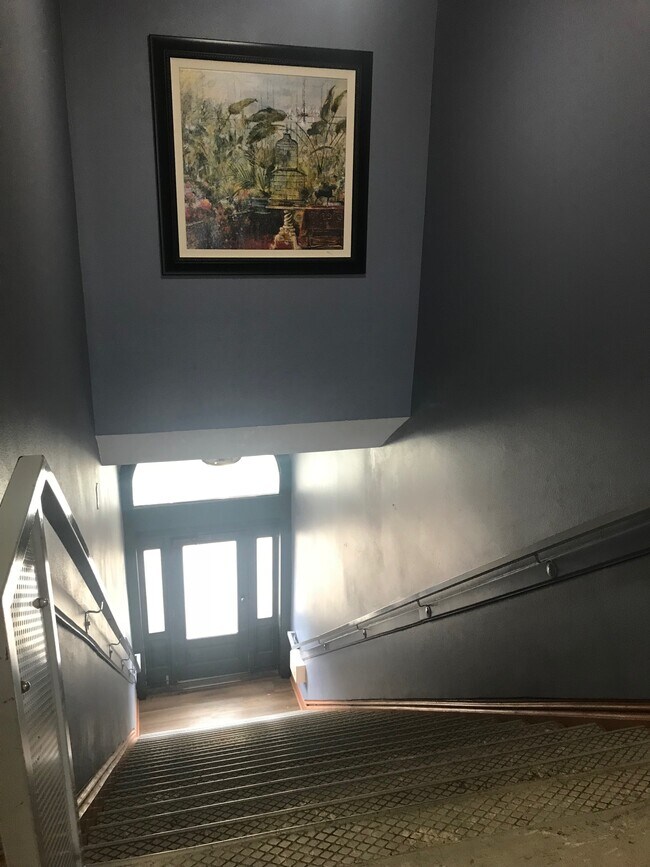 top of the stairs looking down to main entrance - 605 Forest Ave