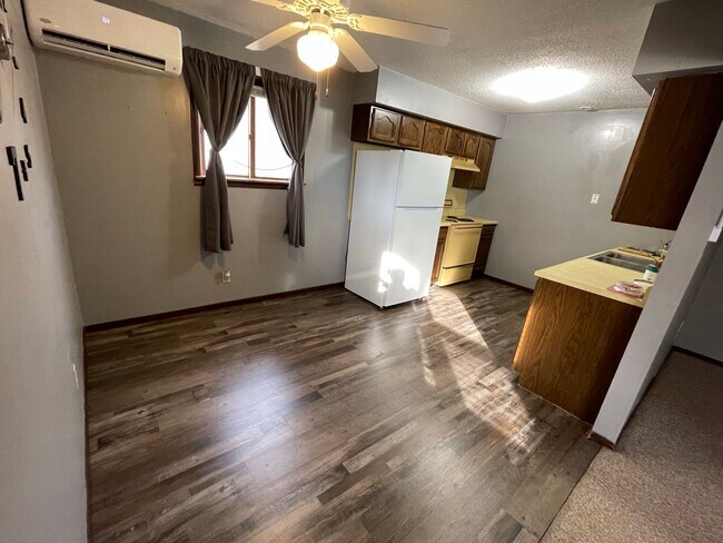 Dining area and kitchen - 105 N Lear St