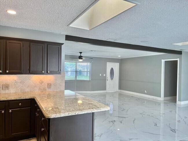 Building Photo - 4130 NW 9th Ct