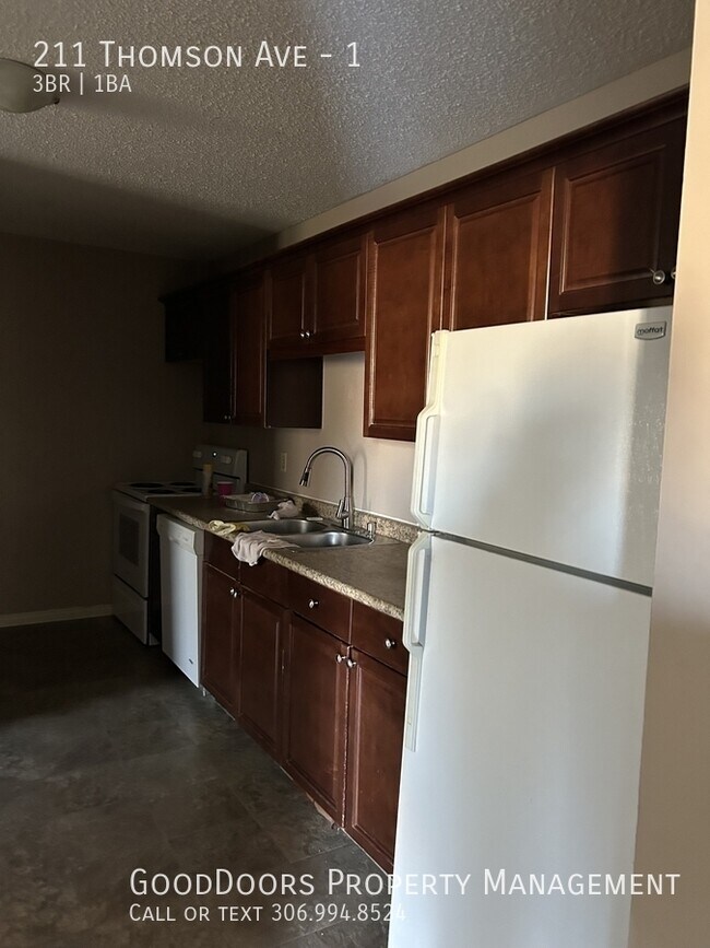 Photo du bâtiment - 211 Thomson Ave