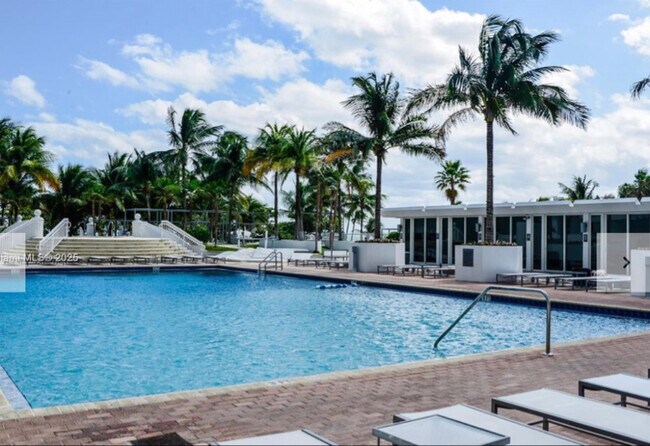 Building Photo - 10275 Collins Ave