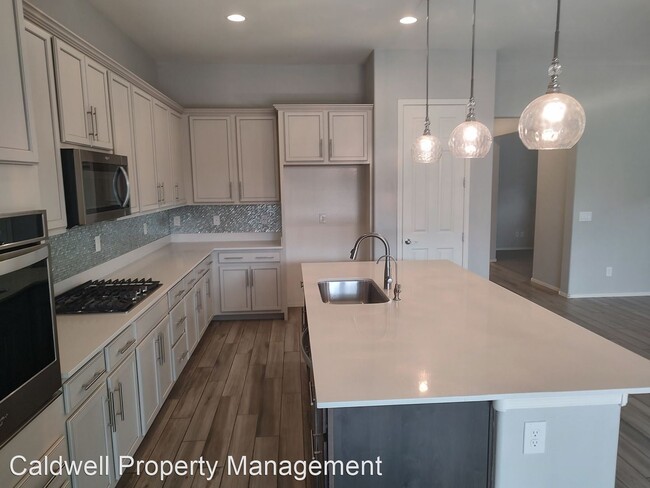 Building Photo - 3 br, 2.5 bath House - 22929 E. Desert Spo...
