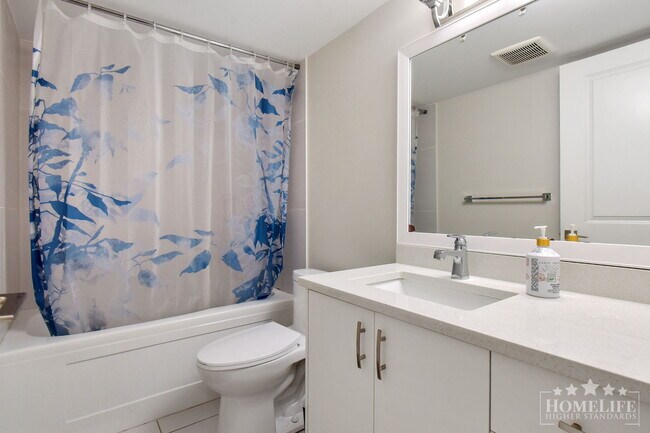 Photo du bâtiment - 2 - Bed + 1 - Bath Basement Suite for Rent...