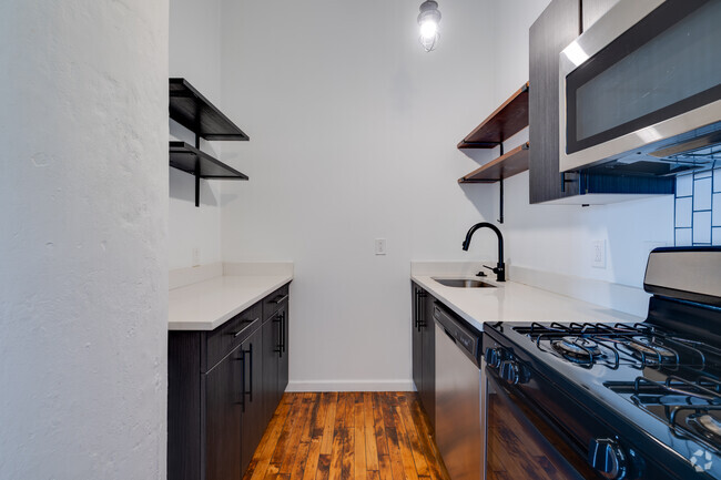 4BR, 2BA - 1,095SF - Kitchen - Spring Lofts