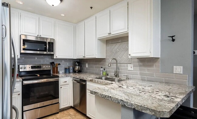 Building Photo - This home offers Luxury Vinyl flooring in ...