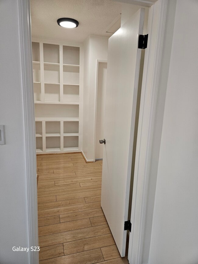 Hallway to bedrooms and linen closet - 1344 E Windsor Rd