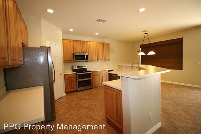 Building Photo - 5 br, 3 bath House - 13633 W Alvarado Dr