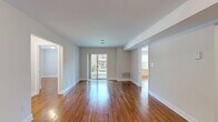 Located at 333 River Dr in Allentown, PA, this well-appointed 2-bedroom, 2-bathroom residence offers a comfortable and functional single-floor layout. Rich hardwood flooring flows consistently throughout the main living areas and bedrooms, lending warmth and cohesion to the space.

The spacious living room is bathed in natural light, enhanced by sliding glass doors that open onto a private balcony with outdoor views — an ideal spot for relaxing or entertaining. The open feel of this central gathering area is complemented by neutral wall tones and clean white trim.

The kitchen is thoughtfully appointed with warm wood cabinetry, granite countertops, and black appliances including a refrigerator and dishwasher. A window above the counter brings in additional natural light, making the space feel bright and inviting.

Both bedrooms are generously sized, with the primary bedroom offering a walk-in closet and direct access to one of the two bathrooms. The second bedroom features a bi-fold closet door providing ample storage. Each bedroom continues the hardwood flooring found throughout the home.

The two bathrooms are finished with light tile flooring and full tub-shower combinations with tile surround accents, offering clean and functional design. Multiple closets and hallways throughout the layout contribute to excellent overall storage and ease of circulation.