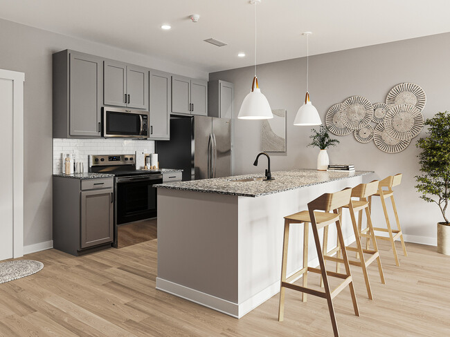 Experience culinary perfection in this stylish and functional kitchen. - South Bank at Quarry Trails