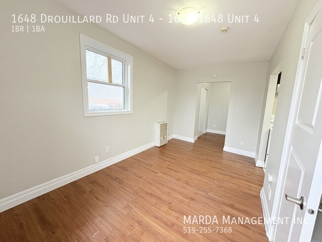 Building Photo - COZY 1BEDROOM/1BATH APARTMENT IN FRIENDLY ...