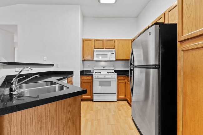 Building Photo - Beautiful Second Story Unit with Sparkling...