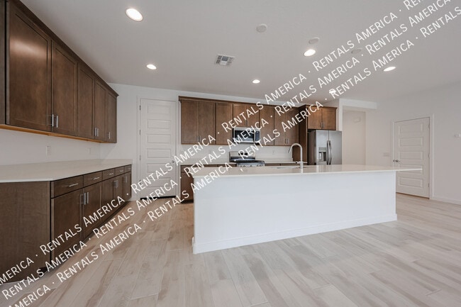 Foto del edificio - 10151 E Ulysses Ave