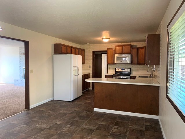 Building Photo - Great home in Moyina Heights
