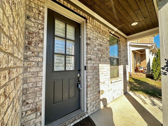 Building Photo - Master BR Main Floor!  End Unit,  Backs up...