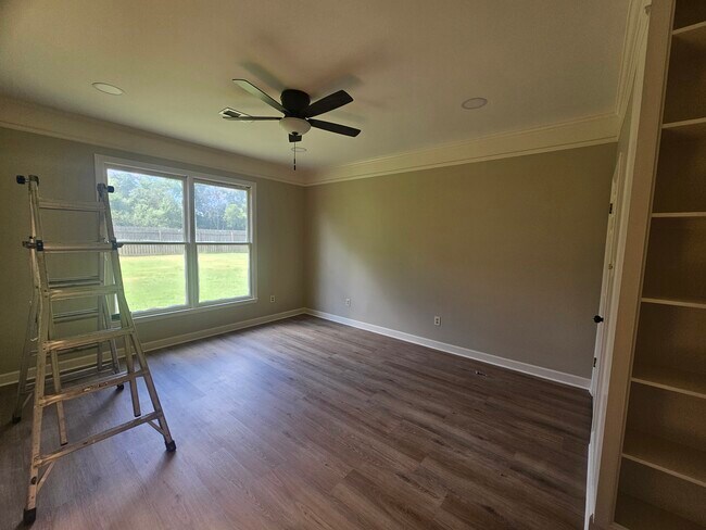 Master bedroom with built in book shelves - 7765 Whitten Point Cv