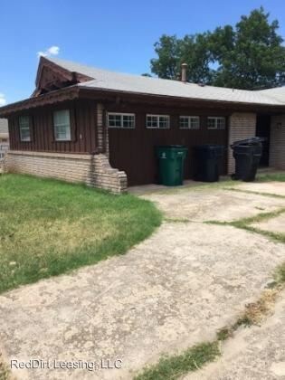 Building Photo - 4 br, 2.5 bath House - 521 SW 62nd Terr