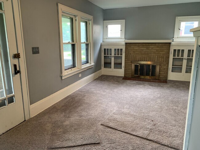 Living room w/ fire place - 345 Norton Ave
