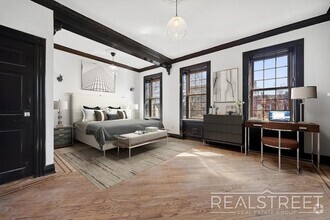 Building Photo - Timelessly Renovated Historic Triplex with...