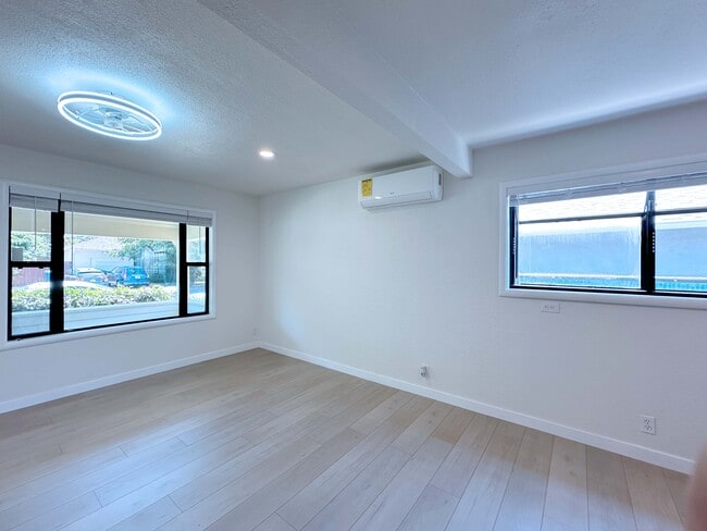 Enjoy comfort and efficiency with beautiful flooring, LED lighting, ceiling fan, and a new heat pump - 4570 58th St