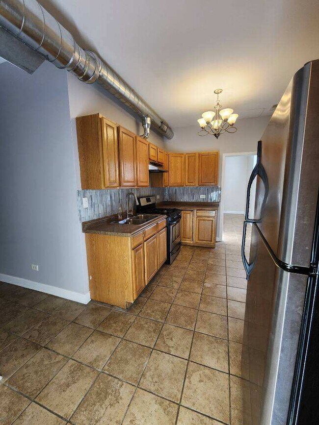 Foto del edificio - 1451 N Hamlin Ave