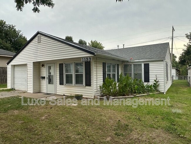 Building Photo - 1133 S Miles Ave