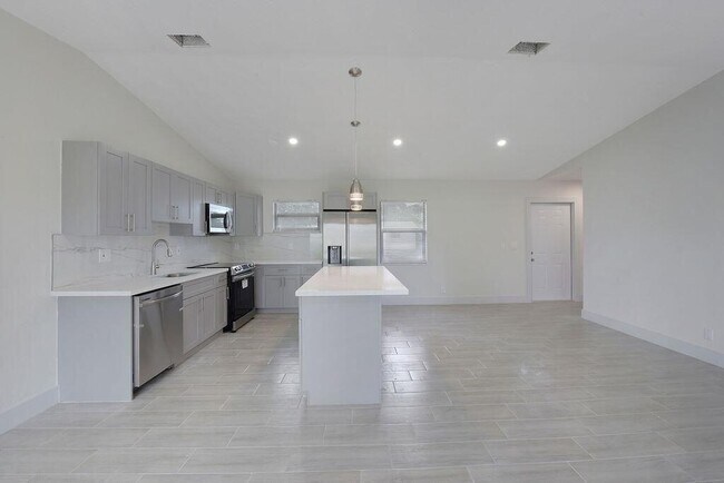 Foto del edificio - 1109 W 23rd St