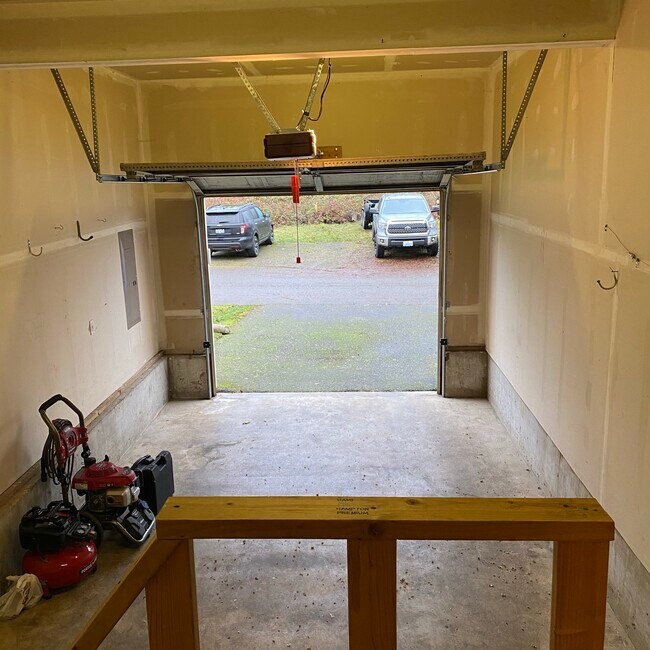 1 car garage with access to across the street parking. - 943 College Ln NE