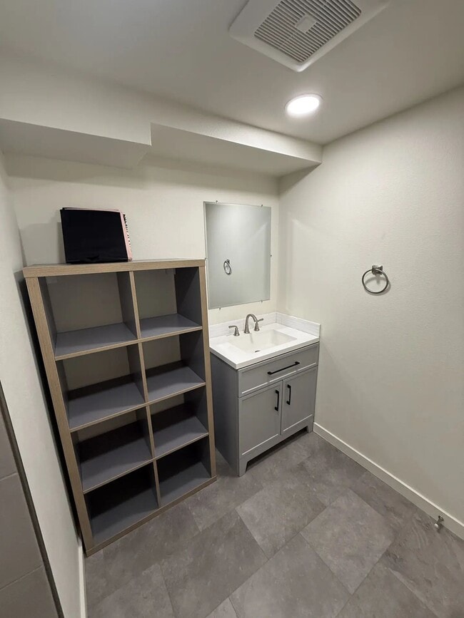 Building Photo - Newly Renovated Basement Unit with Private Fully Fenced Back Yard and Exclusive Parking Area