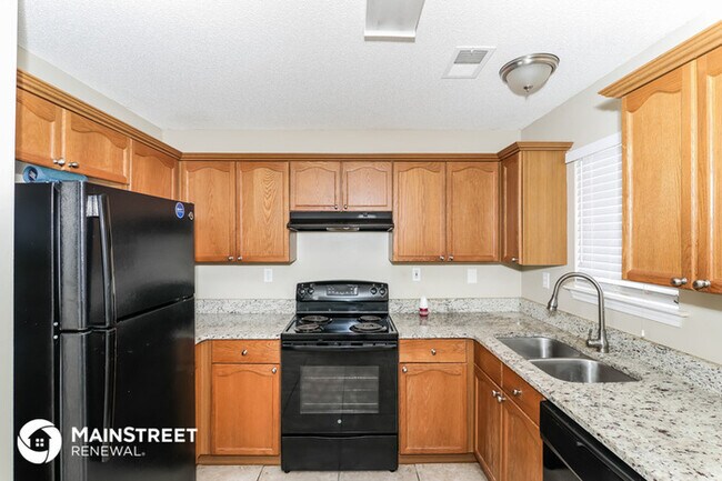Building Photo - 4604 Sun Ridge Dr