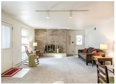 Open living and dining space with lots of natural light - 1694 E River Rd