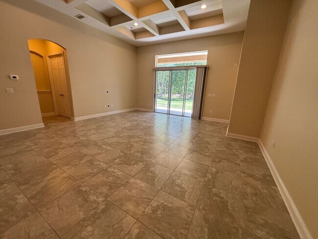 Foto del edificio - Spacious 4BR/3BA Home with 3-Car Garage, Bonus Office & Covered Patio in St Johns!