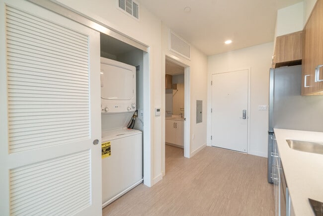Building Photo - Secure Your Dream Home at RUMI – Fully Furnished Units with Stunning Views!
